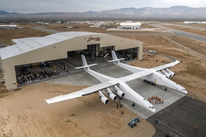 The aircraft from Stratolaunch has 385-foot wingspan and weighs around 500,000 pounds or 226,796 kg.