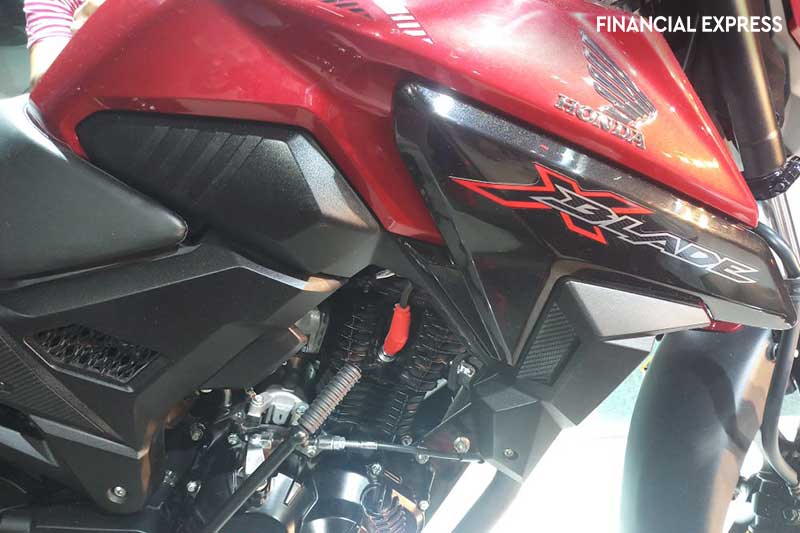 While the sculpted fuel tank looks large, it will have a capacity of 12 litres, which should translate into a range of around 600 km, assuming a fuel-efficiency of around 50 km to a litre of petrol.