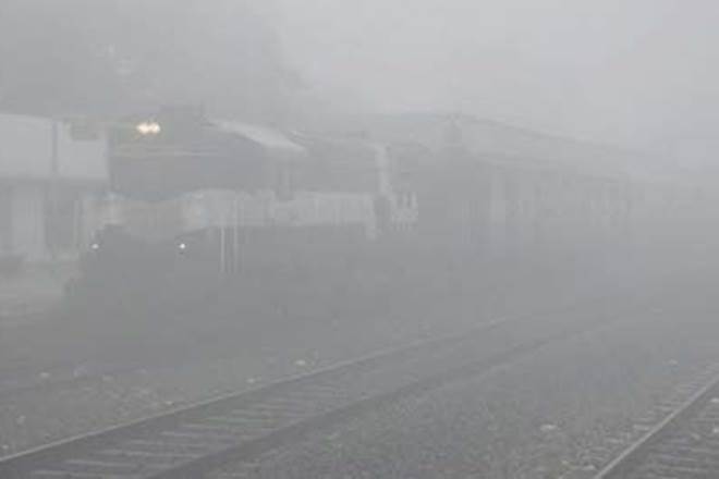 delhi fog, temperature in Delhi, train status, railway enquiry, trains cancelled, railway traffic, delhi weather, delhi temperature