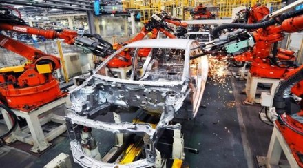 (111208) -- BEIJING, Dec. 8, 2011 (Xinhua) -- Robotic arms are busy working on the assembly line in Geely Auto factory in Linghai, east China's Zhejiang Province, Dec. 2, 2011. "If China had not entered into WTO, we wouldn't have Geely," remarks Li Shufu, president of Geely Holding Group, who always attributed Geely's achievements to China's WTO admission. As one of China's top auto manufactures, Geely, the private automaker transforming its business from low end fridge-making, found its success in automobiles. Li says the worries and concerns served to up the pressure under which some would wither and some thrive. After entering the WTO, China's auto industry has survived the impact of cancelling the protective tariff and maintained strong momentum. Geely acquired the Swedish brand Volvo from U.S. auto giant Ford for 1.8 billion U.S. dollars last August, marking the first time a Chinese car maker acquired an international car brand. It was reported that Volvo's auto sales in world market grew 26 percent from January to October this year. Volvo witnessed a turn-around in car market and has now returned to profitability. "Some Chinese feared China's entry of the WTO and cried, 'the wolves are coming', but I saw opportunities," said Li. His vision for Geely