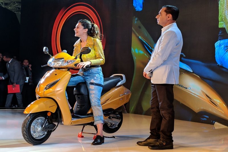 Auto Expo 2018: Another Bollywood Celebrity, Taapsee Pannu charmed the Honda Motorcycle stall with her presence and sharing her journey with Honda Activa much before she became an actress. Taapsee and Honda Activa relation go way back and she did become nostalgic while sharing her story. Taapsee and HMSI also launched a new safety campaign 'Helmet On, Safety On'.