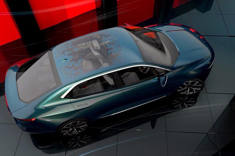 The new Tata E-Vision electric sedan gets an aluminium Humanity line that extends across the width of the car. The Diamond shaped DLO has been defined by another aluminum blade that runs from A to C pillar.