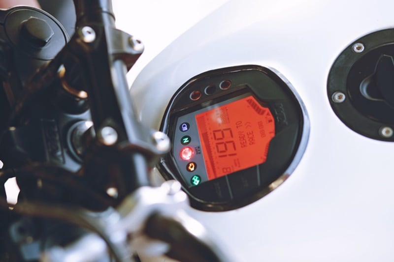 The instrument cluster of the KTM 390 Duke Badmaash has been fitted on the fuel tank, just like the one that you must have seen on some of the high end cruiser motorcycles. The unit is the same but its different positioning is what makes it interesting. Image Credit - Demotic Media