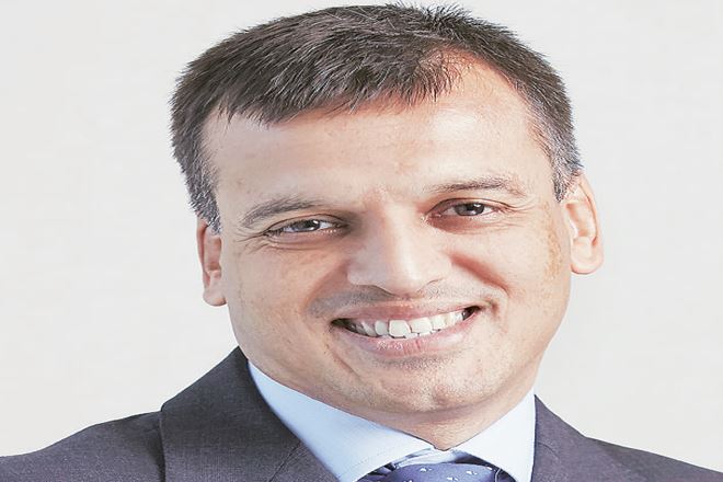 Bajaj Finance, NBFC, India, MobiKwik, banking licence, rural business, gst