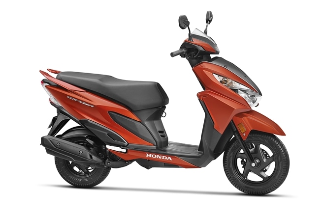 Honda Grazia: Honda Grazia comes with 124.9 cc that produces 8.52 bhp and 10.54 Nm. It gets a disc up front and a drum brake at the rear, and is equipped with CBS (combi-brake system). Prices start at Rs 59,900 (ex-showroom). The Grazia currently has a Dusshera discount of Rs 2000. <a href="https://www.financialexpress.com/auto/reviews/honda-grazia-review-japanese-reliability-with-fancier-clothes-added-convenience/929506/"><strong>Honda Grazia review: Japanese reliability with fancier clothes, added convenience</strong></a>