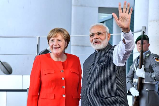Narendra Modi, Narendra Modi in UK, Angela Merkel, Narendra Modi in London, German Chancellor Angela Merkel, india news Narendra Modi, Narendra Modi in UK, Angela Merkel, Narendra Modi in London, German Chancellor Angela Merkel, india news