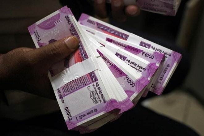 Rupee ends below 65-level against US dollar; crude oil breaches $70-mark; 6 points to know