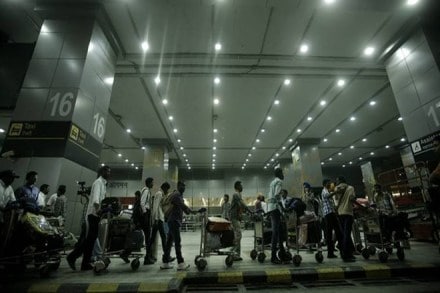 A British national has been apprehended at the Delhi airport here for allegedly using a fake ticket to enter the terminal area, official sources said today.