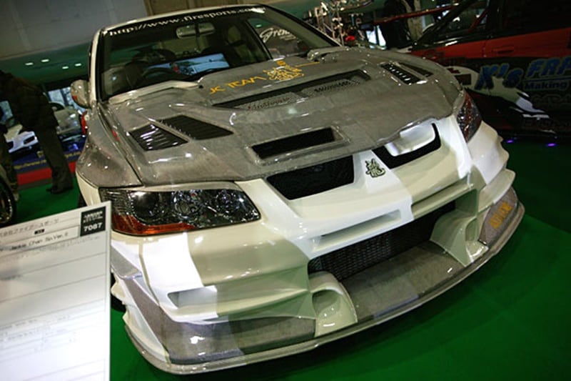Custom Mitsubishi Lancer Evolution 8: Mitsubishi’s Motorsport arm Ralliart produced 50 Jackie Chan Special Edition versions of the Lancer Evo 8 in September 2006. What's so special about it? It could lap the 22 km Nurburgring in 8 minutes and 11 seconds and came at a price tag of $77,000. It is powered by a 2-litre turbocharged engine that can propel it to 222 km/h. (Image: listhogs)