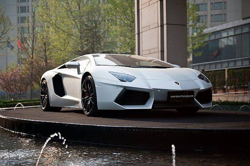 Jackie Chan Edition Lamborghini Aventador: Another of the custom builds in Jackie Chan's car collection. It is powered by a 6.5-litre V12 engine that produces 690 hp. Not many mechanical tweaks were made, however, several changes were made on the exterior and interior, such as a unique titanium gray exterior paint, a unique red and black theme on the inside among others. (Image: listhogs)