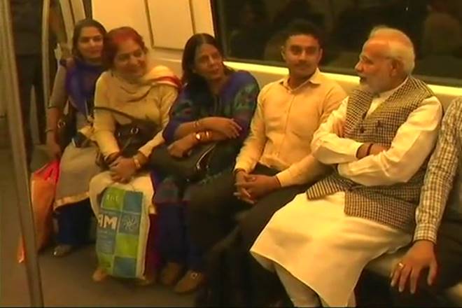 PM Narendra Modi, modi in metro, modi in delhi metro, delhi metro, modi delhi metro video, modi delhi picture, Ambedkar memorial narendra modi, ambedkar birth anniversary, narendra modi