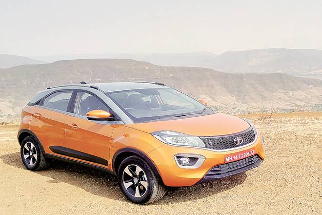 Car review of Tata Nexon AMT, price of Tata Nexon AMT, features of  Tata Nexon AMT, tesla,  Tata Motors