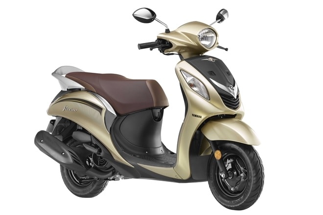 Yamaha Fascino: Yamaha Fascino is powered by a 113 cc engine that produces 7 bhp and 8.1 Nm. It gets drum brakes at both ends. Prices started 54,800 (ex-showroom). The Fascino has a discount of Rs 4700 for Paytm payments and an additional cashback of Rs 1000.