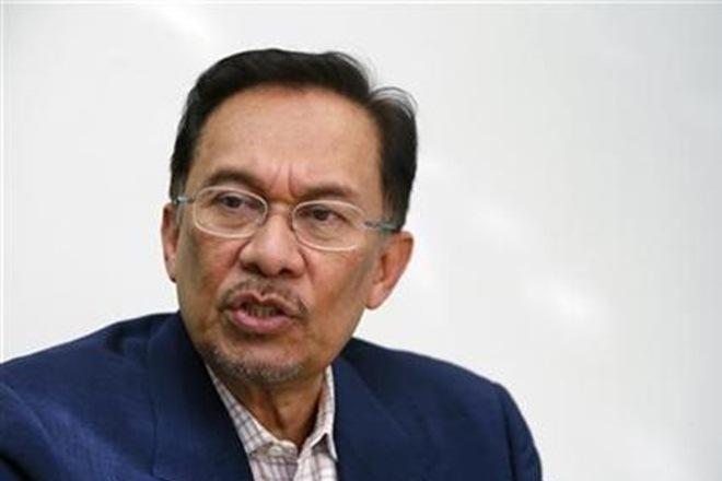 anwar ibrahim, royal pardon, malaysia, young male sodomised