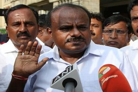 While HD Kumaraswamy was in Delhi handing out bouquets to Sonia Gandhi and Rahul Gandhi, his 85-year-old father Deve Gowda was photographed speaking to the Karnataka chief secretary and police commissioner at his Bengaluru residence.