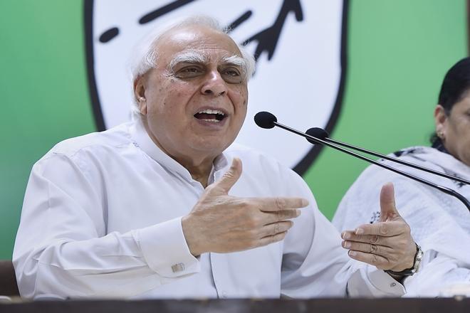 Narendra Modi, Kapil Sibal, Rahul Gandhi, Vishwasghat Divas, Karnataka Assembly election, NDA government Narendra Modi, Kapil Sibal, Rahul Gandhi, Vishwasghat Divas, Karnataka Assembly election, NDA government