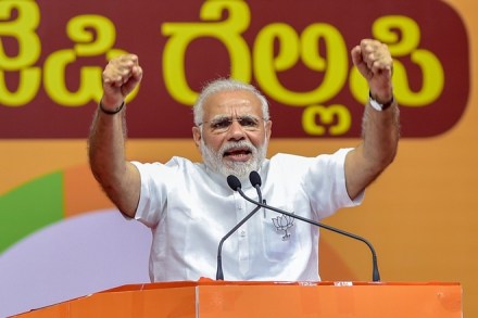 Bengaluru: Prime Minister Narendra Modi addresses a public rally for the Karnataka assembly elections, in Bengaluru on Thursday. PTI Photo by Shailendra Bhojak (PTI5_3_2018_000166A)