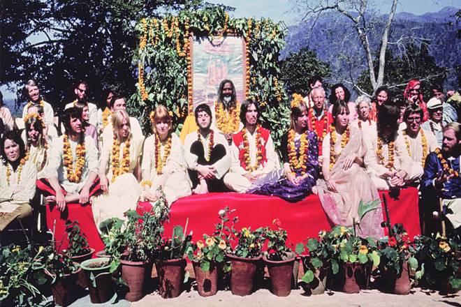 A file photo of The Beatles (seated in front row) with Maharishi Mahesh Yogi at his ashram in Rishikesh in 1968.