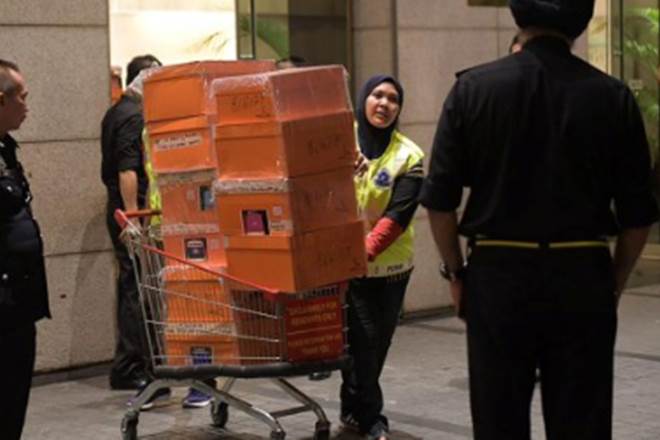 malaysia, najib razak, desiner handbags, cash filled handbags, jewellery, najib razak scandal