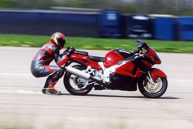 Fastest speed dragged behind a motorcycle: While it may sound like a pointless thing to do but it does involve some level skill, which you won't be using unless you're a stunt double in Hollywood. Gary Rothwell had a Suzuki Hayabusa drag him at speeds up to 250 km/h for his Guinness World Record. Rothwell achieved the feat by wearing a pair of boots with 2 mm-thick titanium soles. (Image: guinnessworldrecords)