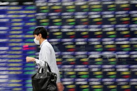 Asian shares slip on trade worries, oil gives up some gains; Bitcoin hits 7-month low
