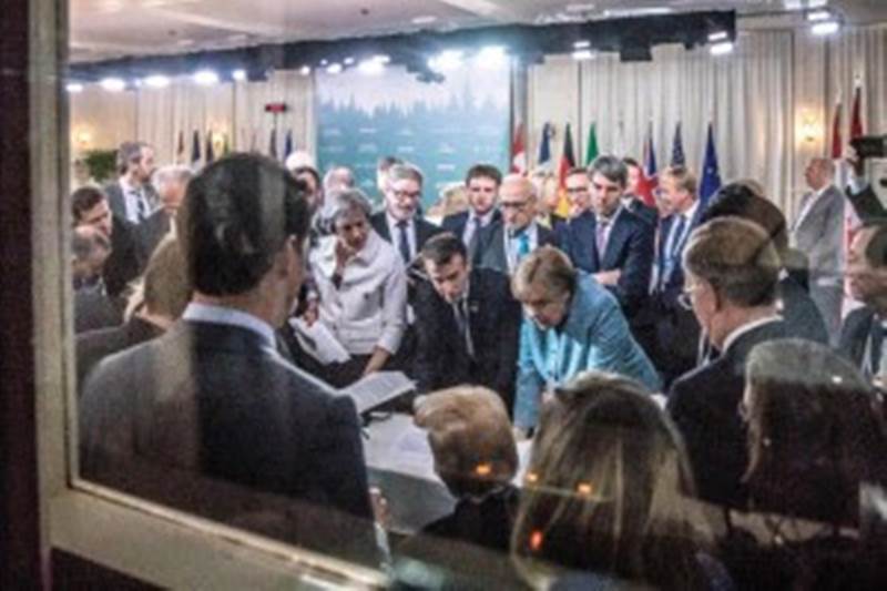 Apart from Merkel and Trump, there were US national security adviser John Bolton, Japanese senior deputy minister for foreign affairs Kazuyuki Yamazaki, Japan’s prime minister Shinzo Abe, Japanese deputy chief cabinet secretary Yasutoshi Nishimura, French president Emmanuel Macron, UK prime minister Theresa May and Director of the US National Economic Council Larry Kudlow.
