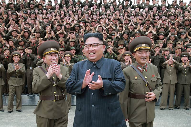 Kim Jong Un is considered as the supreme leader of North Korea. Un acknowledges a welcome from the military officers during his visit to Korean People's Army's Strategic Forces in North Korea. (AP image)