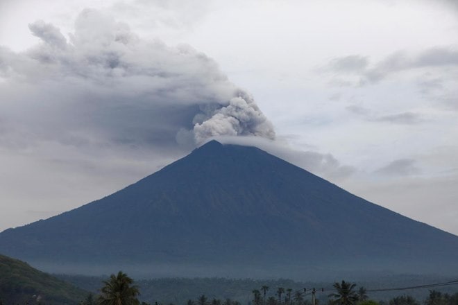 The eruption of Mount Agung in eastern Bali yesterday has triggered at least 48 flight cancellations. (Reuiters) The eruption of Mount Agung in eastern Bali yesterday has triggered at least 48 flight cancellations. (Reuiters)