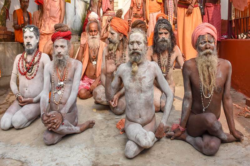 Sadhus perform yoga to commemorate International Day of Yoga 2018 at Kamakhya temple in Guwahati (PTI Photo)