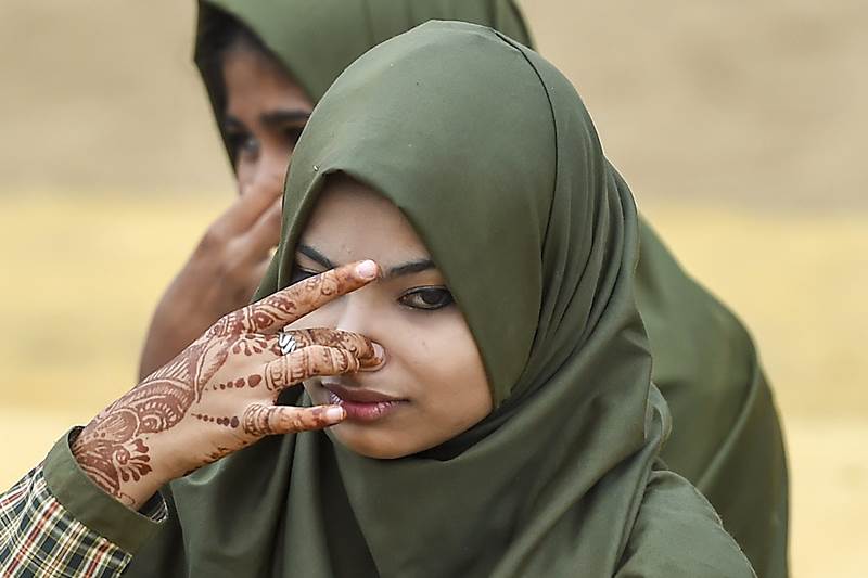 A girl-student performs yoga to mark the 4th International Day of Yoga (IYD 2018) at Kanteerava stadium, in Bengaluru (PTI image)