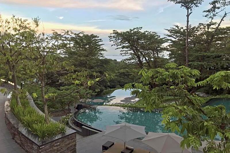 This photo shows pools at the Capella Hotel. Notably, State Department spokesperson Heather Nauert said the US is not paying for the North Korean delegation to stay in Singapore. (AP image)