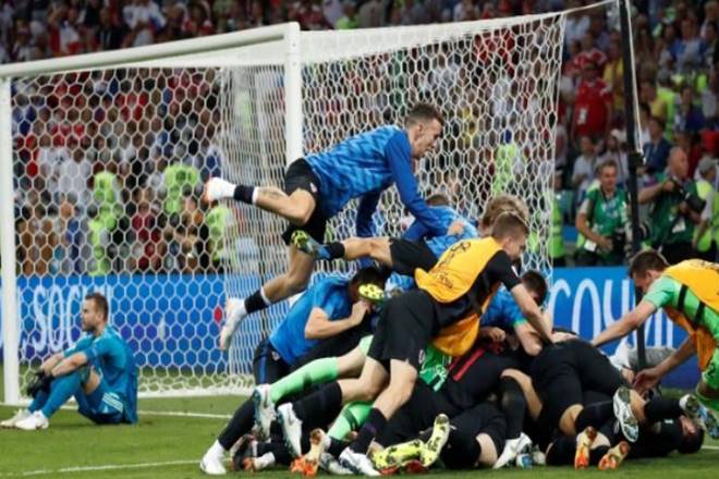 Croatia's Ivan Rakitic celebrates with team mates after scoring the deciding penalty during the shootout (Image: REUTERS) Croatia's Ivan Rakitic celebrates with team mates after scoring the deciding penalty during the shootout (Image: REUTERS)