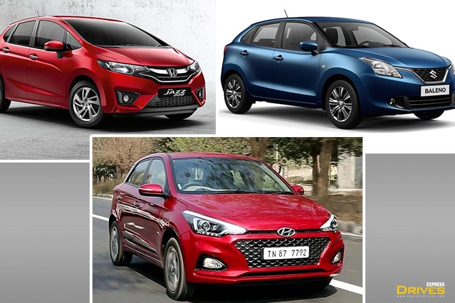 The 2018 Honda Jazz has been launched in India and the battle in the premium hatch space has heated up once again. In this detailed image gallery, we compare the interiors of three cars namely Honda Jazz, Maruti Suzuki Baleno and the Hyundai i20. In the next few slides, you will go through multiple elements inside the cabin of the three cars and how are they different from one other.
