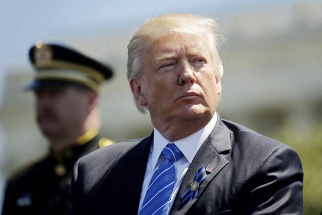 Donald Trump asks National Football League to suspend anthem protesters