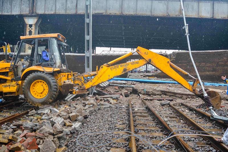 Mumbai footover bridge, Mumbai foot over bridge, Mumbai footover bridge collapse, Mumbai footover bridge incident, mumbai bridge collapse, mumbai bridge news, mumbai bridge accident, mumbai bridge collapse news, mumbai bridge collapse photos