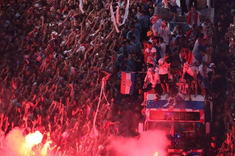Croatia team bus and fans during the parade
