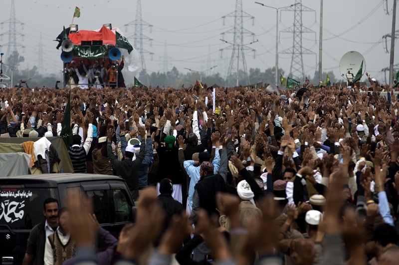These outfits had started their preparations last year. People raise their hands to express their support for Khadim Hussain Rizvi, leader of the radical political party, Tehreek-i-Labbaik Ya Rasool Allah, during the anti-government protest in Islamabad late last year.