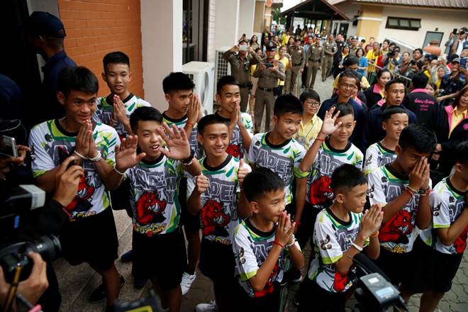 Eleven of the boys and the coach prayed to ancient relics and offered drinks and desserts placed in gilded bowls to spirits in a ceremony Tuesday at a temple in northern Thailand.