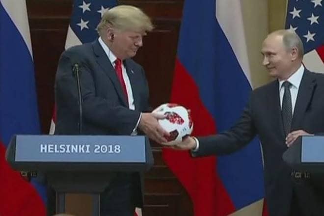 Vladimir Putin presents Donald Trump with FIFA World Cup’s official ball