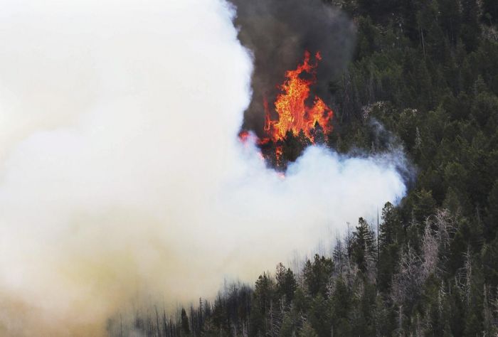 The so-called Klamathon Fire was one of dozens of blazes across the dry American West, fueled by rising temperatures and gusty winds that were expected to last through the weekend. (AP)