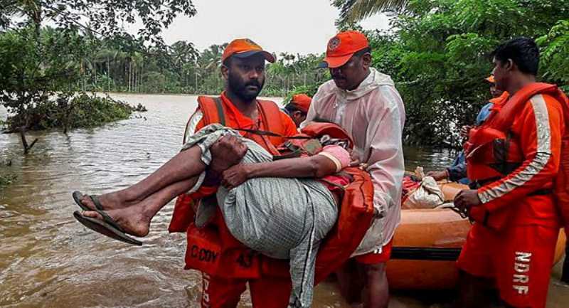 3- Wayanad: NDRF personnel rescue the flood-hit people in Wayanad, Kerala on Saturday, August 11, 2018. (PTI)
