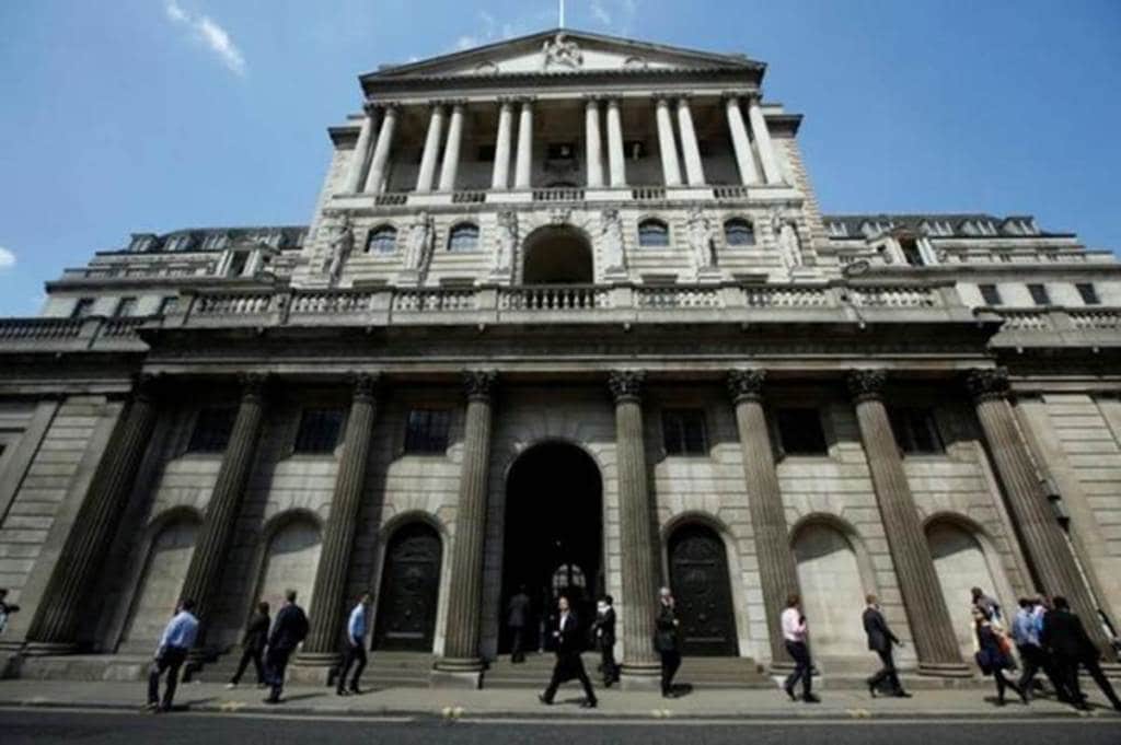 Bank of England raises rates above crisis lows, signals no rush for next hike