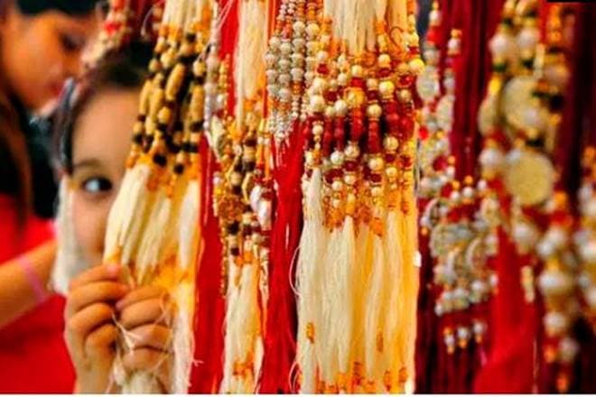 On the occasion, sisters pray for the good health and well being of their brothers and in lieu get gifts from their brother. (Source: Express Photo by Sahil Walia)