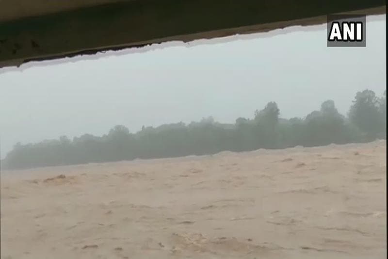 himachal pradesh rain news, rainfall in himachal pradesh, himachal pradesh rain pictures, himachal pradesh rain images, jammu tawi river flood, jammu tawi river images, jammu tawi river pics, yamuna river photos, beas river images, beas river tragedy images