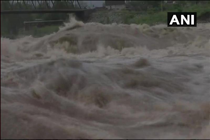 himachal pradesh rain news, rainfall in himachal pradesh, himachal pradesh rain pictures, himachal pradesh rain images, jammu tawi river flood, jammu tawi river images, jammu tawi river pics, yamuna river photos, beas river images, beas river tragedy images