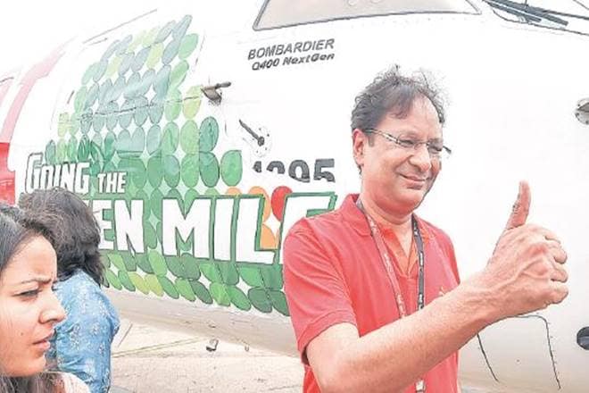 SpiceJet chairman and MD Ajay Singh reacts after landing of the first flight running on biofuel, at the Delhi airport terminal on Monday. (PTI)