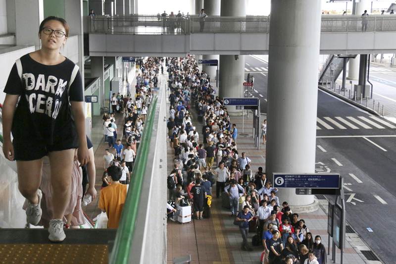 kansai airport japan, kansai airport, kansai international airport, kansai airport sinking, kansai airport japan photos, kansai international airport pictures, kansai airport images, japan typhoon, typhoon jebi