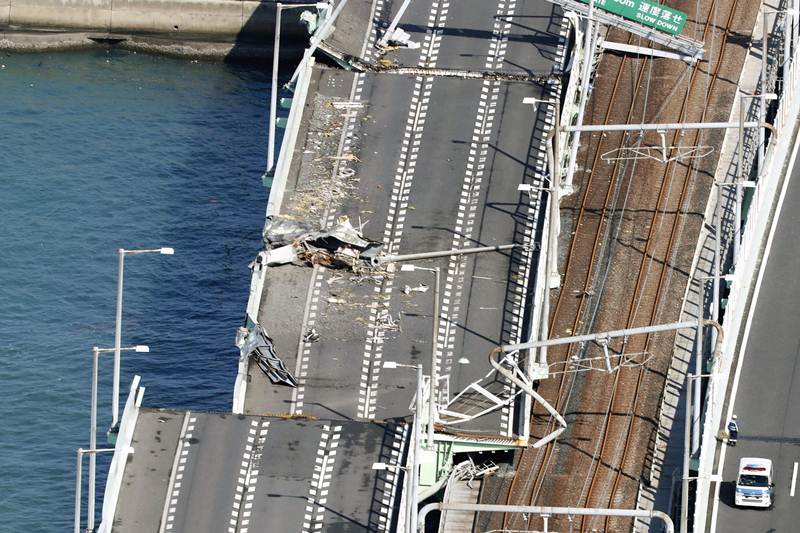 kansai airport japan, kansai airport, kansai international airport, kansai airport sinking, kansai airport japan photos, kansai international airport pictures, kansai airport images, japan typhoon, typhoon jebi
