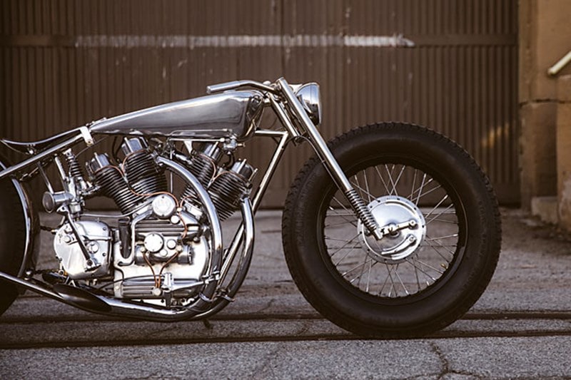Hazan is most particularly impressed with his handiwork of a the shift/clutch linkage. The modified Royal Enfield has a foot clutch, the left footpeg rotates to double as the kickstand and gearshifts are done by hand. (Photo: Pipeburn)