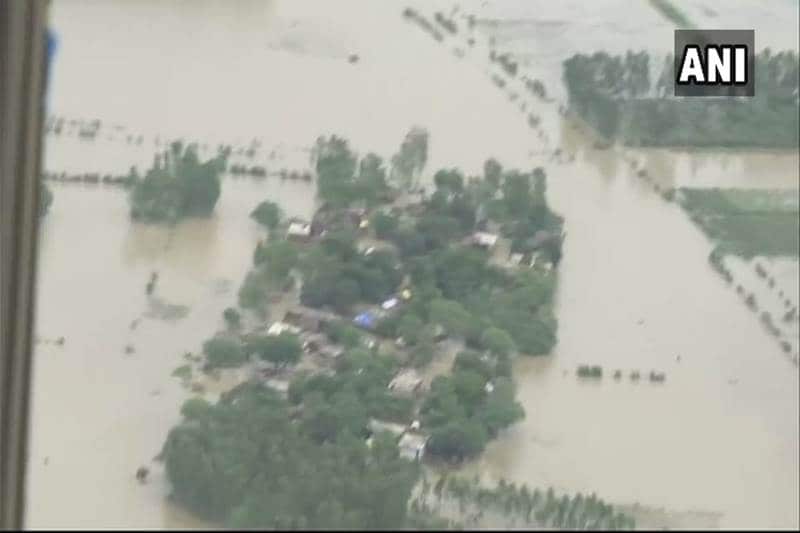 flood in uttar pradesh 2018, flood in up today, flood in up latest news, rain in up today, rain in up, flood images, yogi adityanath